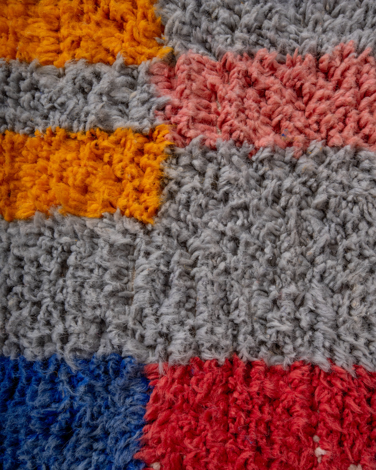 Modern, designer, handcrafted Berber rug from Morocco. Beniourain carpet with beautiful colours and patterns and fluffy wool texture.